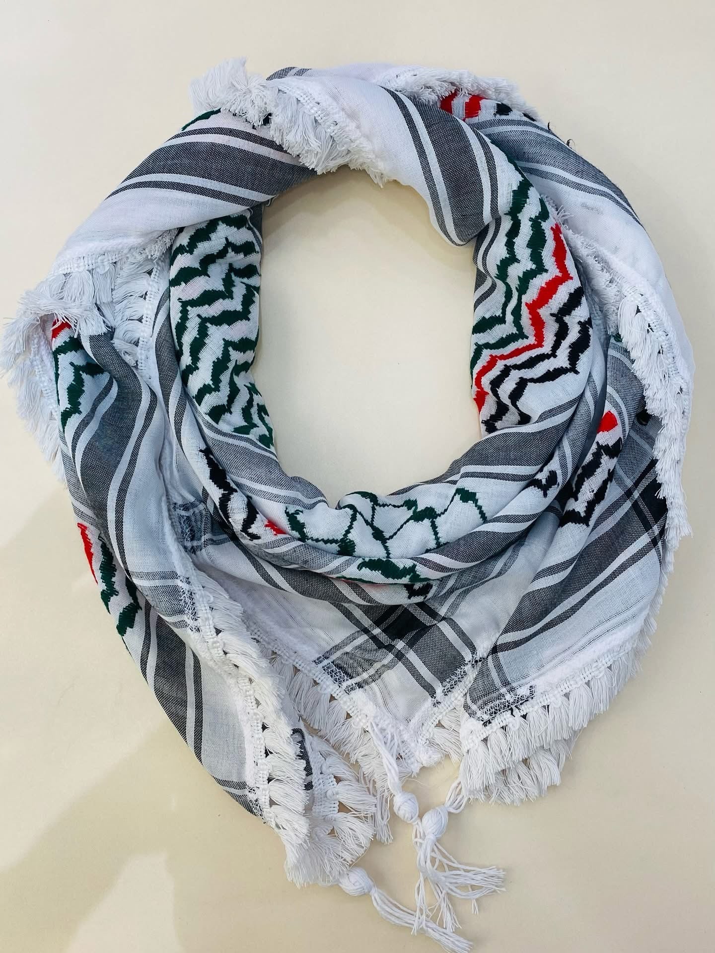 Hand-embroidered scarves ( Kufiya )