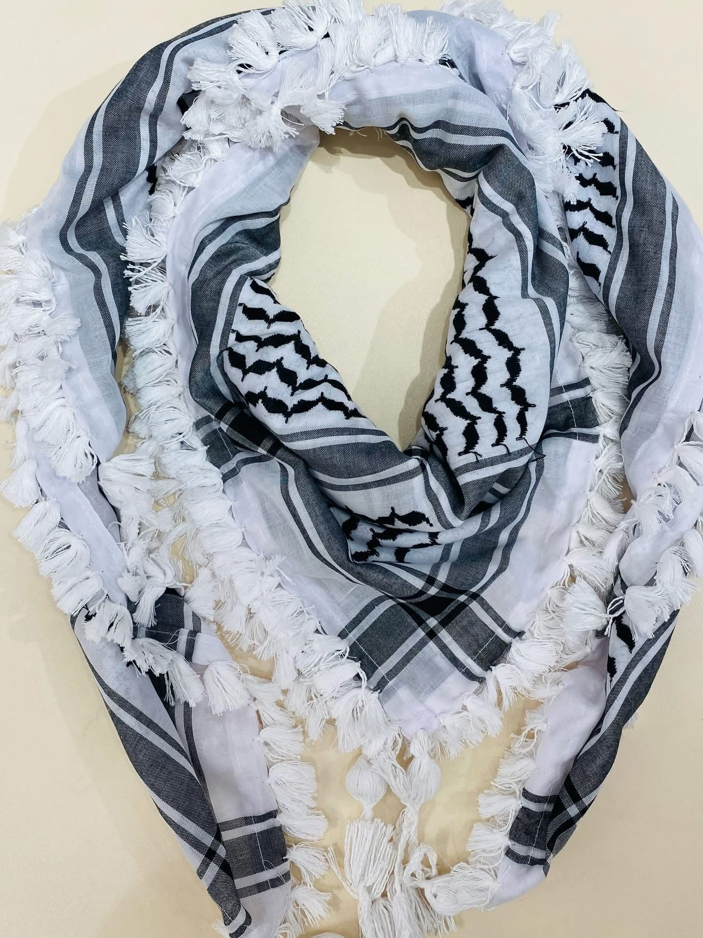 Hand-embroidered scarves ( Kufiya )