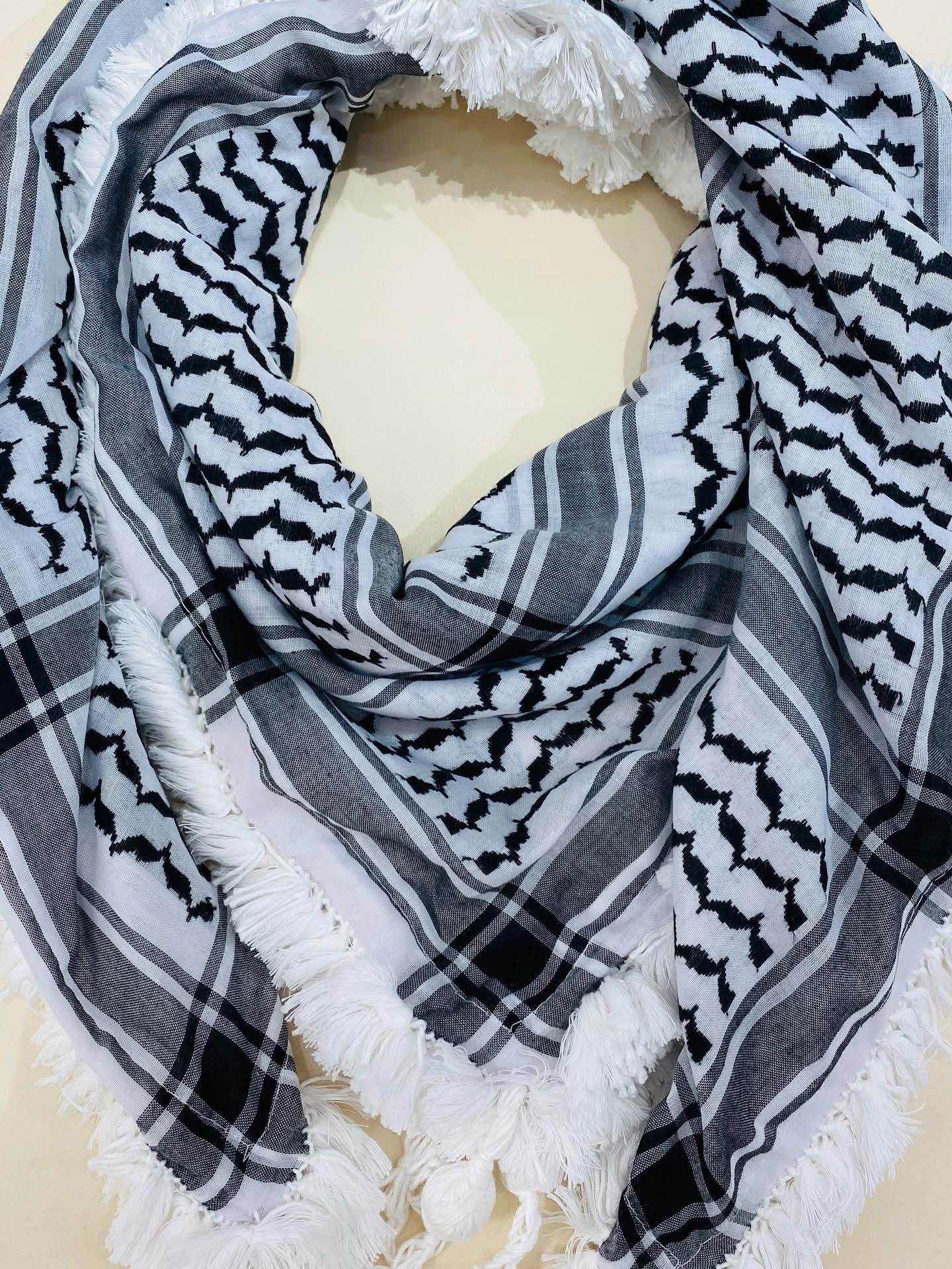 Hand-embroidered scarves ( Kufiya )