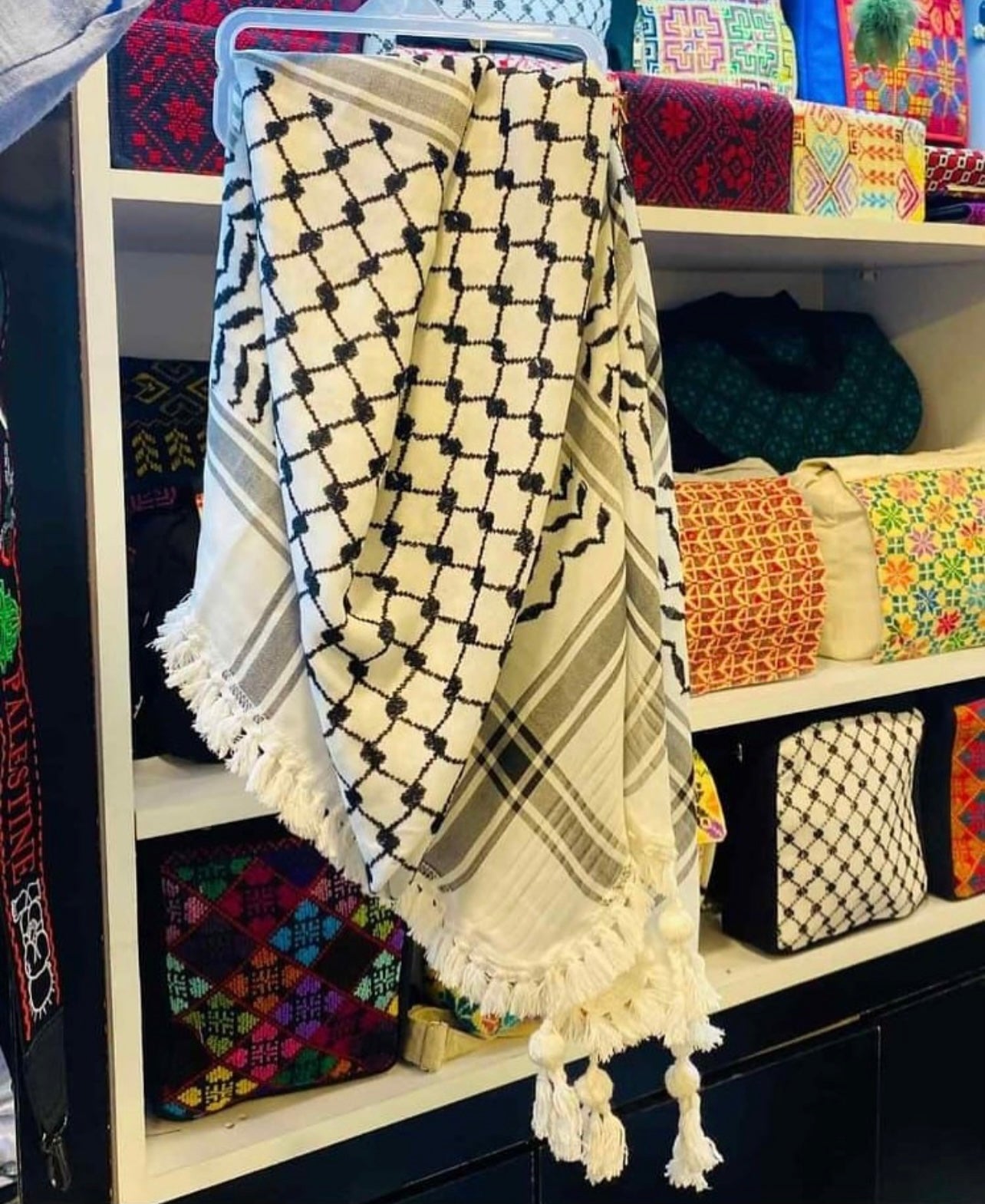 Hand-embroidered scarves ( Kufiya )