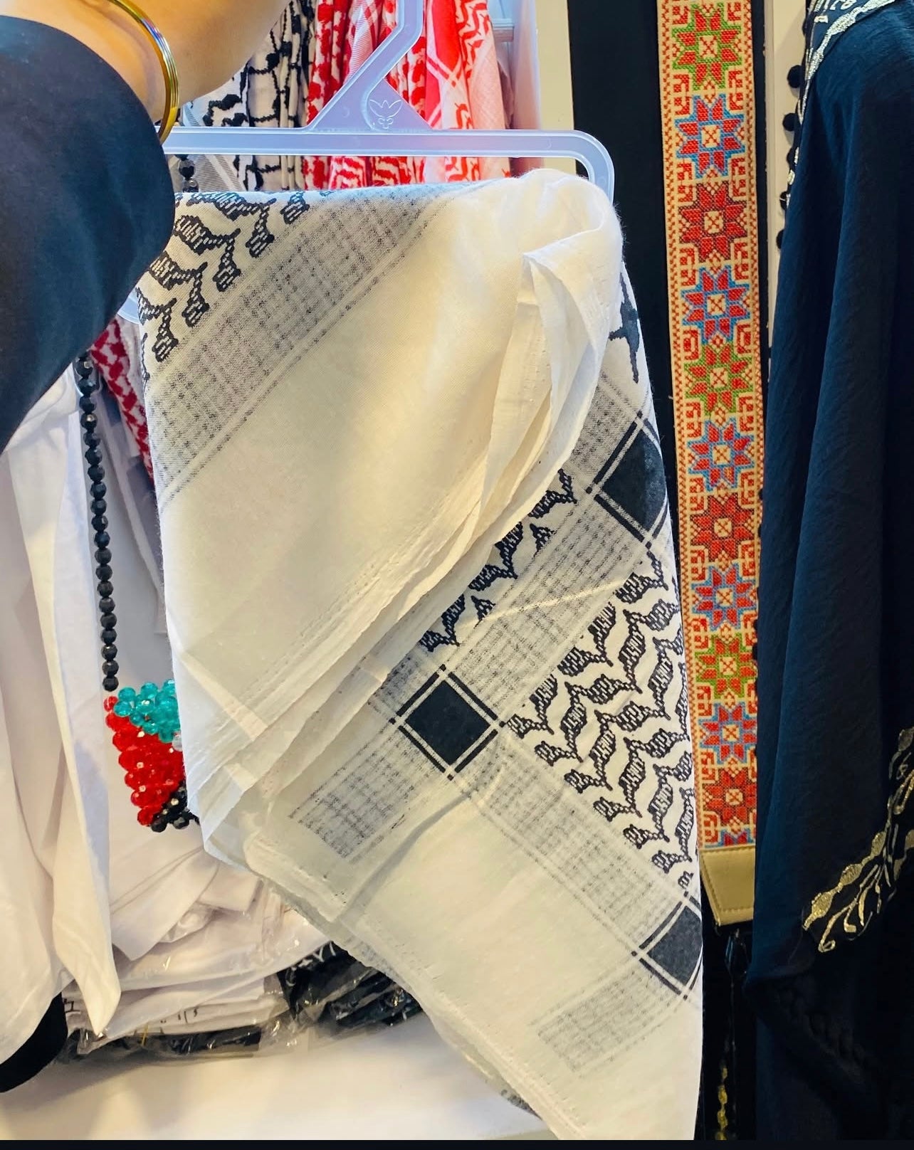 Hand-embroidered scarves ( Kufiya )