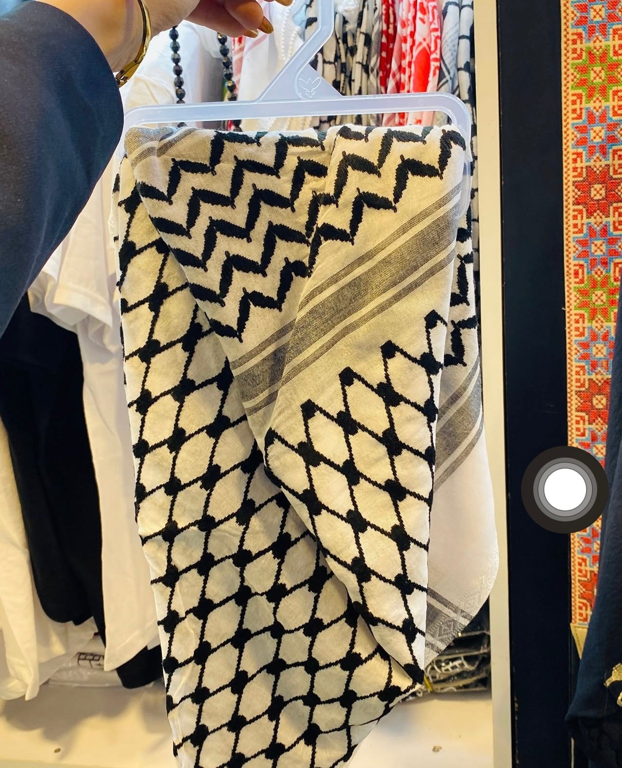 Hand-embroidered scarves ( Kufiya )