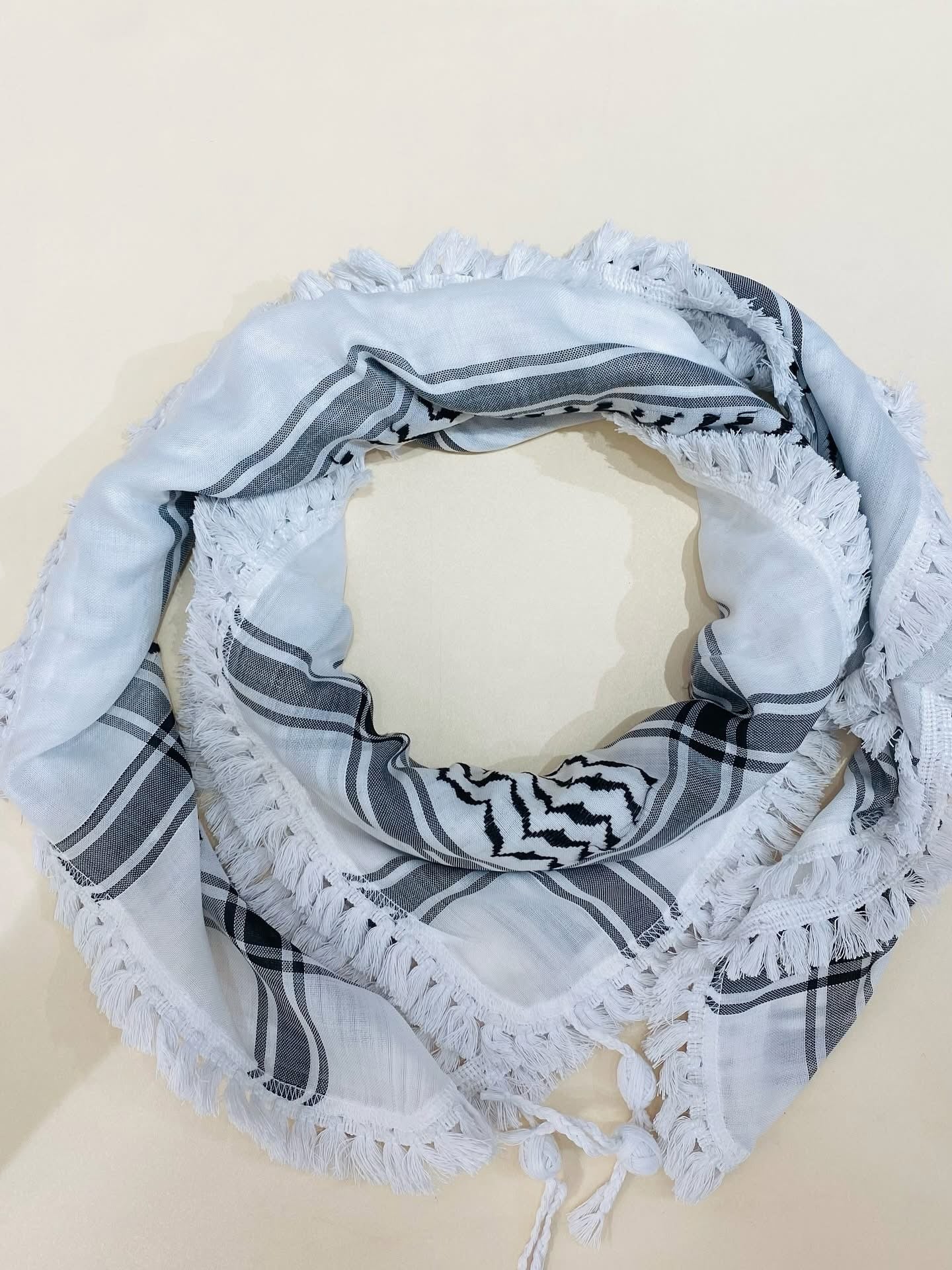 Hand-embroidered scarves ( Kufiya )
