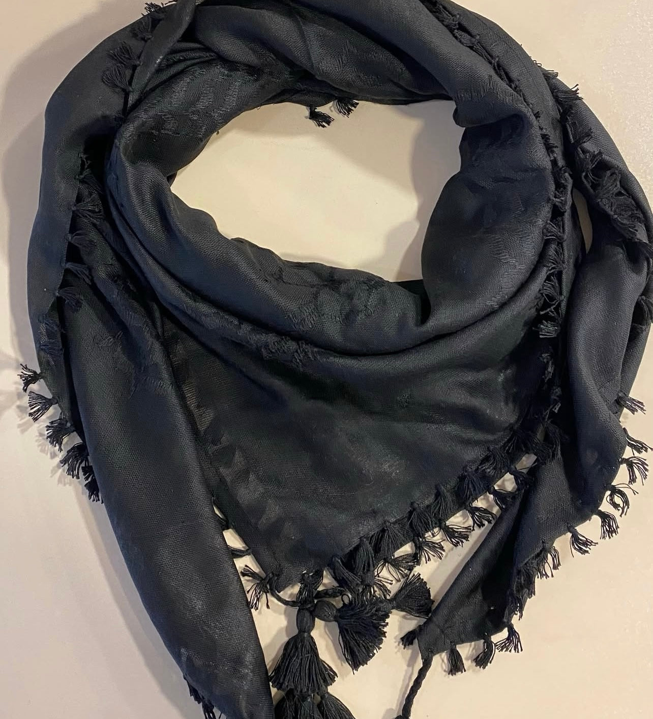 Hand-embroidered scarves ( Kufiya )